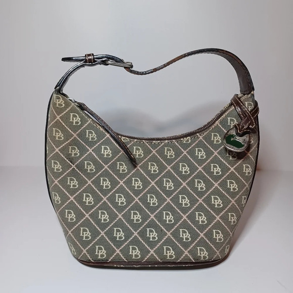 Dooney & Bourke Handbags - Dooney & Bourke canvas handbag Classic Print *Flaws read description* bag has st
